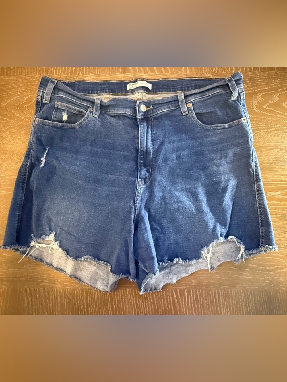 Levi’s Strauss Women’s High-Rise Distressed Denim Shorts in Dark Blue 20W